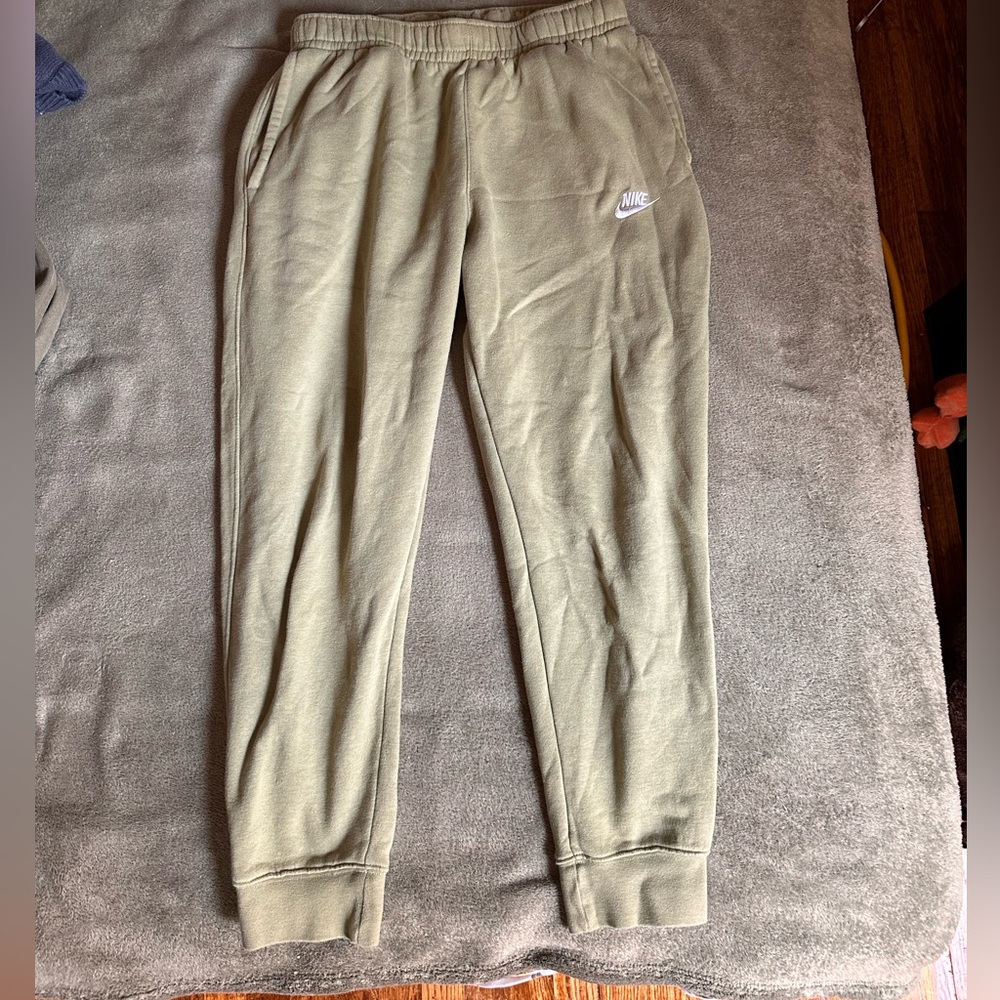Green Nike joggers